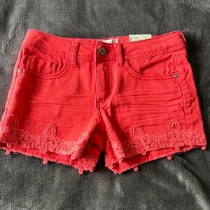 Never worn, still has tags
